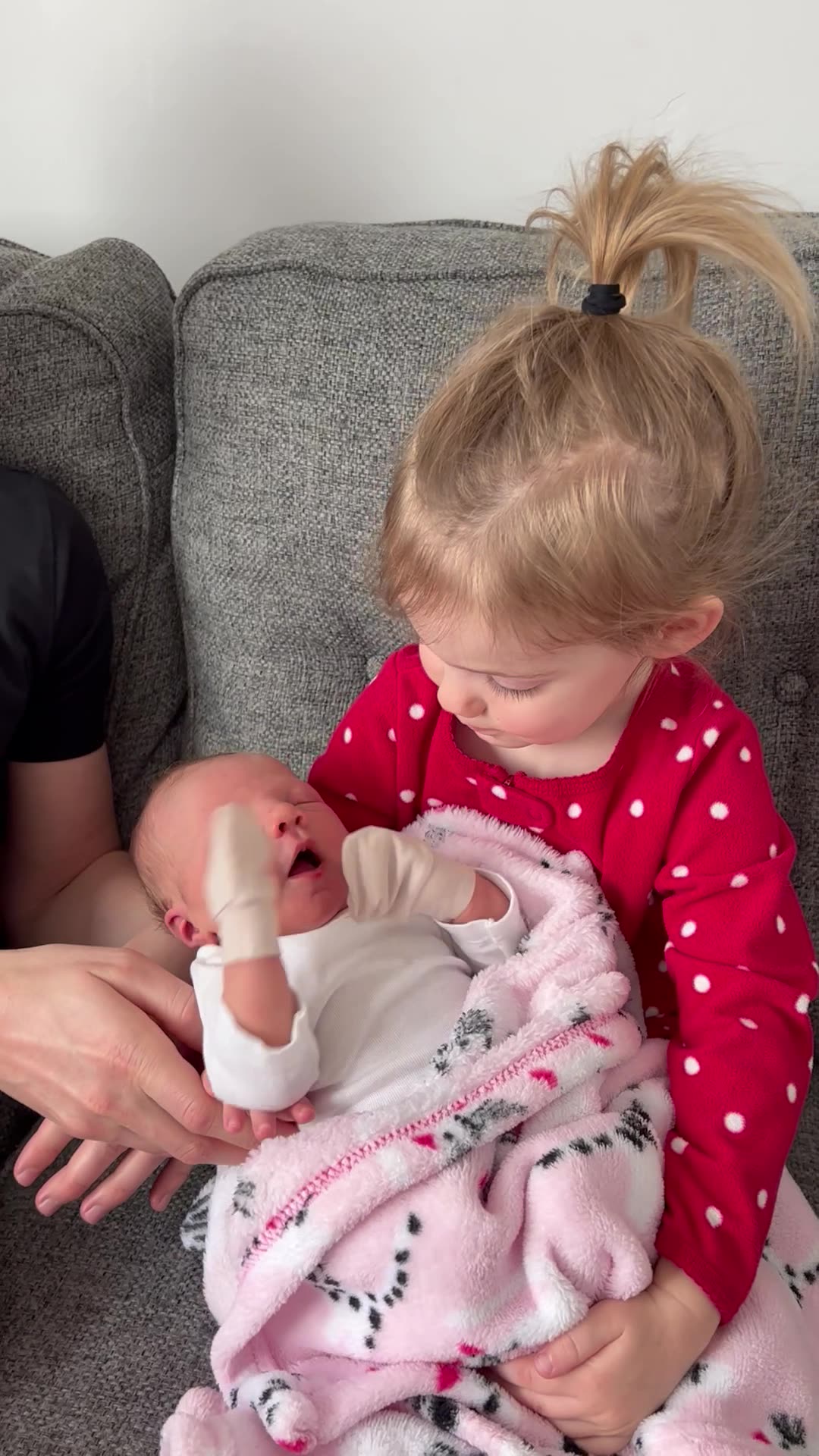 Evie holding Este