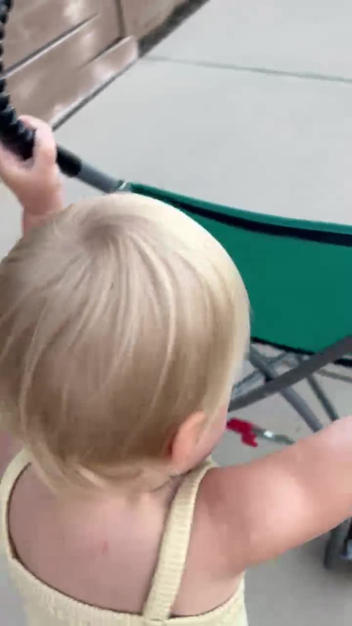 Refused to get in the stroller and just wanted to grunt the whole way to the park like this.